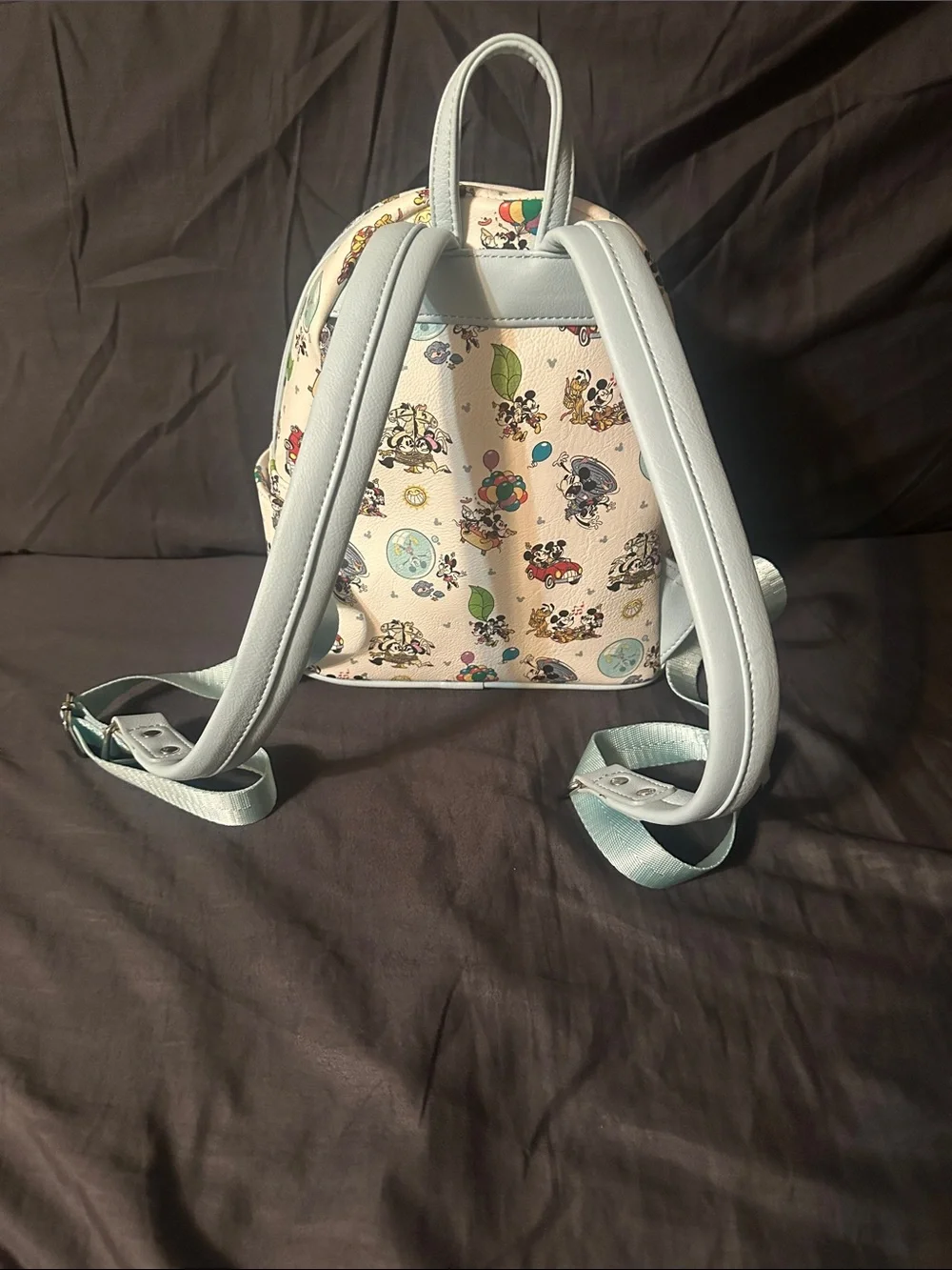 Loungefly Kids Cream Mini Backpack with Light Blue Trim and Disney Print.